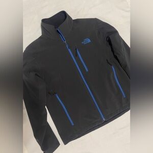 The North Face Men's Black Jacket with Vibrant Blue Zippers Size Medium